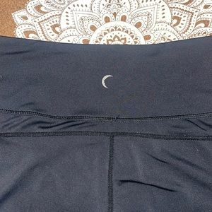 Zyia black size 6-8 light in tights with pockets, 24 inch